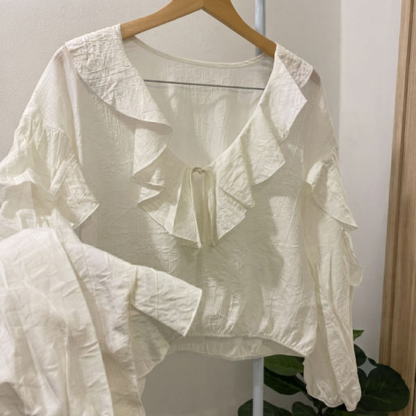 Blusa volare