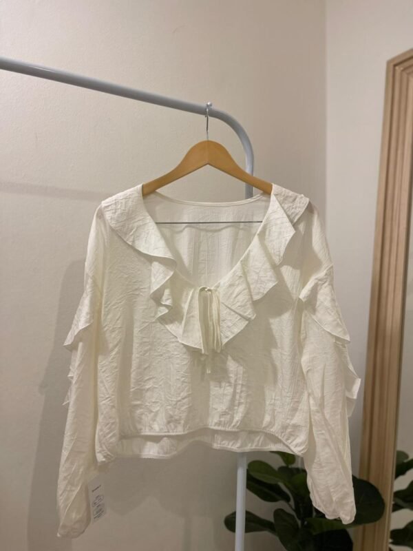 Blusa volare